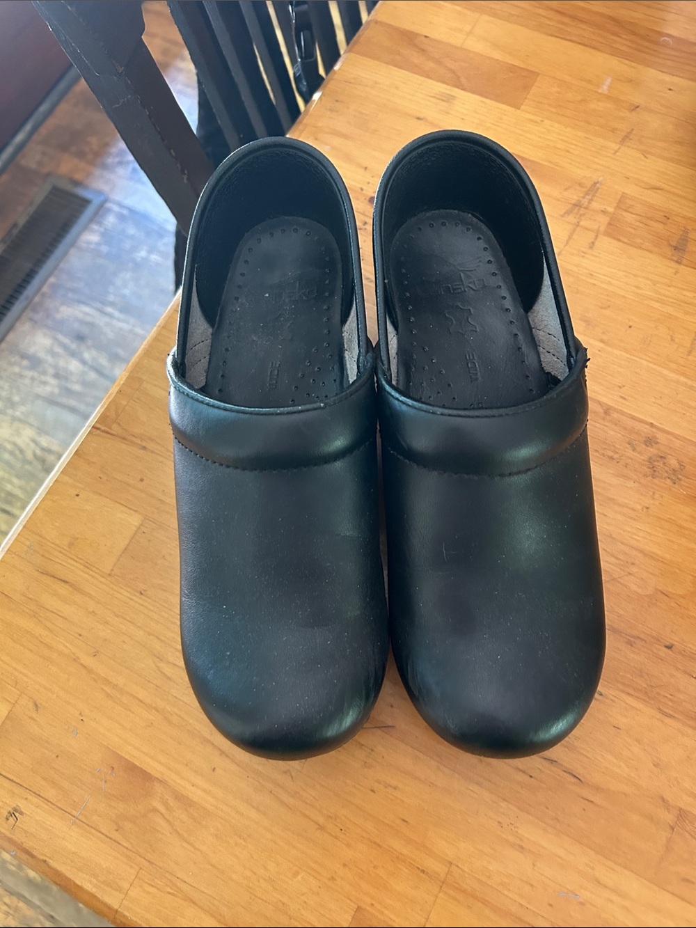 Women's Dansko Black Leather Slip-On Clogs